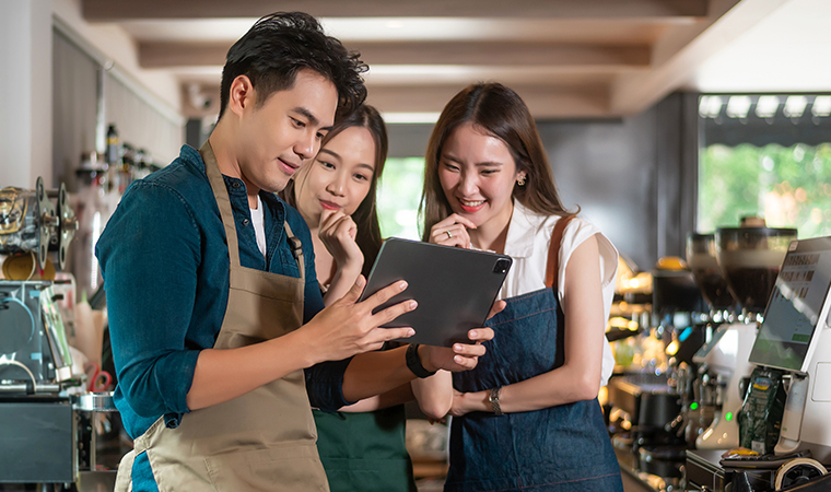 business owners talking in cafe